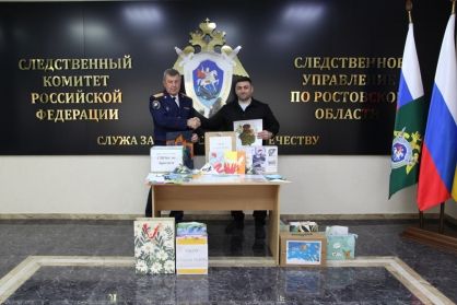 В единстве - наша сила: следователи следственного управления и школьники поддержали участников СВО в День народного единства