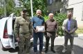 Денис Бурыка и Мурат Харцызов передали автомобиль бойцам, выполняющим задачи СВО